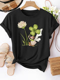 Women's T-Shirt Delicate Clover Amid Blossoming Flowers With Adorable Sleeping Fairy