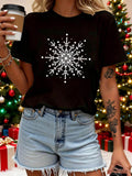 Women's T-Shirt Intricate Winter Flakes Sparkling Amid Holiday Lights Snowflake