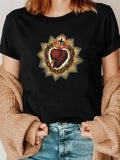 Women's T-Shirt Radiant Golden Flame Surrounded Sacred Heart Emblem