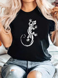 Women's T-Shirt Intricate Swirling Patterns On Sleek Silhouette Of Graceful Gecko