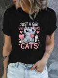 Women's T-Shirt Just A Girl Surrounded By Pink Hearts Sitting Beside Playful Gray Cat