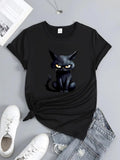 Women's T-Shirt Dark Silky Fur With Golden Eyes Sitting Under Moody Shadows Cat