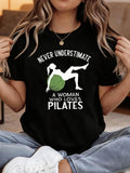 Women's T-Shirt Never Underestimate Calm Graceful Woman Stretching On Pilates Ball