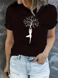 Women's T-Shirt Yoga Woman Posing With Tree Branches And Blossoming Leaves Silhouette