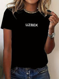 Women's T-Shirt Uzbek Bold White Lettering On Plain Black Fabric T Shirt