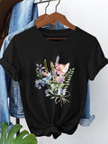 Women's T-Shirt Hand Drawn Branches And Pastel Blossoms Among Soft Green Leaves Flower