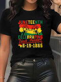 Women's T-Shirt Juneteenth Celebrating Black Freedom With Raised Fists And Sunset Silhouette