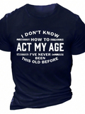 Men's T-Shirt I Dont Know How To Act My Age Playful White Lettering On A Classic Black Cotton T Shirt