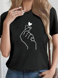Women's T-Shirt Outlined Hand With Minimalist Heart Graphic Gesture