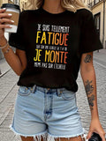 Women's T-Shirt Faded Text With Playful Typography Against Urban Street Black Tshirt