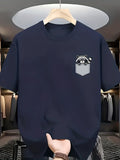 Men's T-Shirt Playful Cartoon Raccoon Peeking Out Pocket On Soft Cotton Shirt