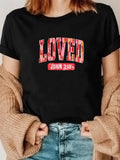 Women's T-Shirt Loved With Vibrant Lettering And Script Under Sunlit Shadows T Shirt