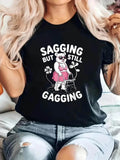 Women's T-Shirt Sagging But Still Gagging Humorous Elderly Woman With Sunglasses And Walker