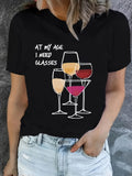 Women's T-Shirt At My Age I Need Glasses Filled With Colorful Wine Glasses