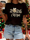 Women's T-Shirt Happy New Year 2026 With Sparkling Ornament Surrounded By Festive Holiday Lights
