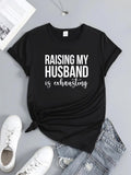 Women's T-Shirt Raising My Husband Is Exhausting Bold White Lettering Playful Quote Shirt