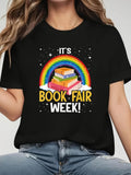 Women's T-Shirt Its Book Fair Week Colorful Rainbow Over Piled Books Under Starry Night Sky