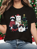 Women's T-Shirt Playful Christmas Cats With Santa Hats And Festive Tree Surrounded By Snowy Holiday Decorations Cat
