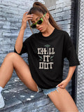 Women's T-Shirt Chill It Out With Stylized Tropical Leaf Motifs On Relaxed Black T Shirt