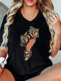 Women's T-Shirt Hand Holding Money Surrounded By Sparkling Jewelry On Black Shirt