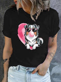 Women's T-Shirt Playful Dog Blowing Bubblegum Wearing Sunglasses Beside Pink Heart