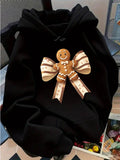 Women's Hoodie Joyful Holiday Gingerbread Man With A Decorative Ribbon Centerpiece