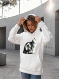 Women's Hoodie Relaxed Outdoor Scene With Sunlight Surrounding A Realistic Sitting Cat
