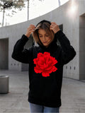 Women's Hoodie Vivid Red Bloom Among Urban Scenery On Black Hoodie Flower
