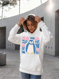 Women's Hoodie Playful Penguin With Blue Foliage And Pink Blossoms Surrounded By Patterned Leaves Penguin