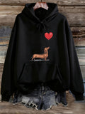 Women's Hoodie Red Heart Floating Above Brown Dachshund Dog