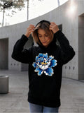 Women's Hoodie Vivid Blue And White Petals Surrounding A Bold Central Blossom Flower
