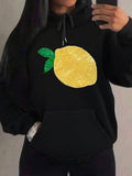 Women's Hoodie Shimmering Glitter Texture With Green Leaves On Bright Fresh Lemon