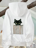 Men's Hoodie Playful Curious Black Cat Peeking Over Rustic Wooden Fence