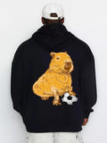 Men's Hoodie Golden Capybara Resting Next To A Black And White Soccer Ball Capybara