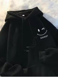 Men's Hoodie Minimalist Winking Smiley Face Under Soft Lighting Hoodie