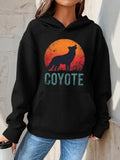 Women's Hoodie Coyote Silhouette Against Warm Sunset Orange Circle Graphic Coyote