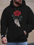 Men's Hoodie Vibrant Red Rose Held By Bony Skeleton Hand Amid Dark Leaves Rose