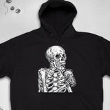Men's Hoodie Detailed Skeleton Holding Beverage Under Shaded Lighting Skeleton
