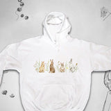 Men's Hoodie Pastel Meadow With Adorable Sitting Rabbits Under Soft Spring Light Bunny