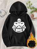 Women's Hoodie Shadowed Helmeted Player Guarding A Classic American Football Ball