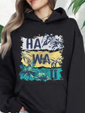 Women's Hoodie Bold Leaves Among Vibrant Colors And Artistic Hawaii Lettering