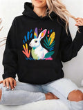 Women's Hoodie Colorful Brush Strokes With Lush Greenery Surrounding Cute White Rabbit
