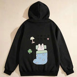 Men's Hoodie Cute Cartoon Bunny Sleeping Among Cozy Pastel Bedding Lamp