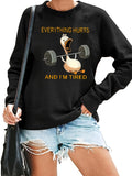 Women's Hoodie Cartoon goose lifting weights with text "EVERYTHING HURTS AND IM TIRED"