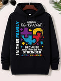 Men's Hoodie In This Family Nobody Fights Alone Because Together We Are Stronger Autism Awareness Vibrant Heart Shape With Scattered Puzzle Pieces Hoodie